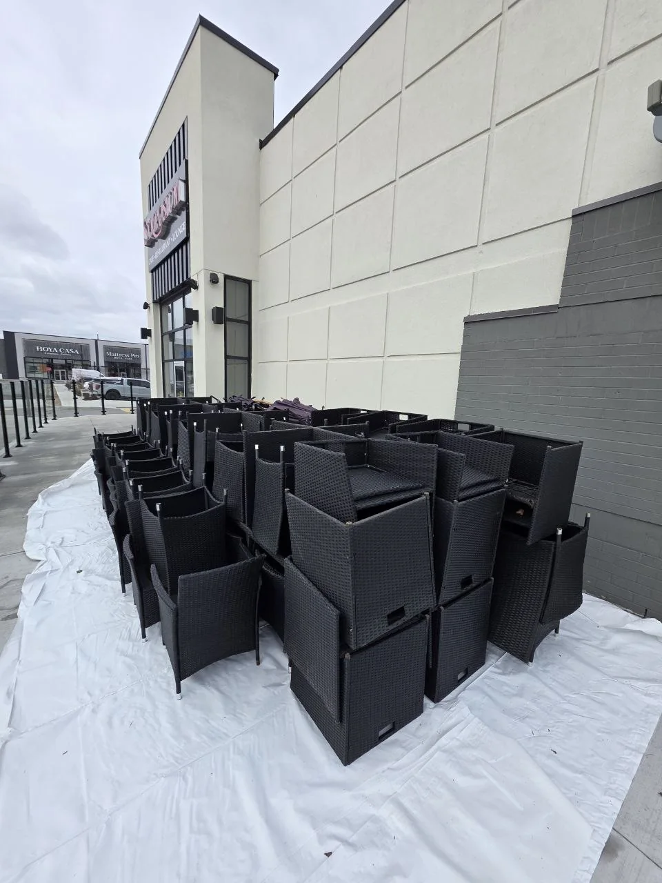 Restaurant patio furniture grouped before shrink wrapping