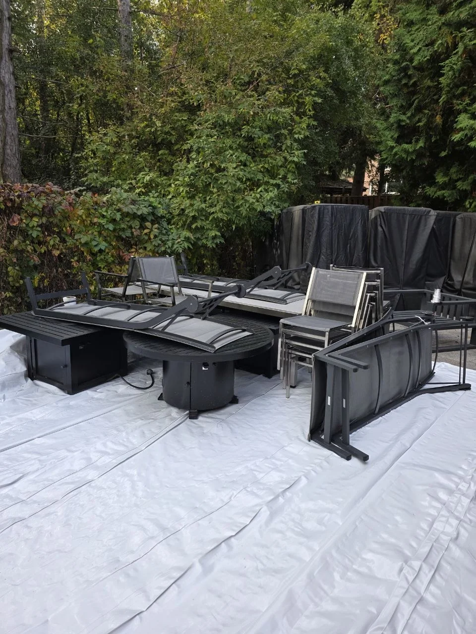 Patio furniture arranged before shrink wrapping
