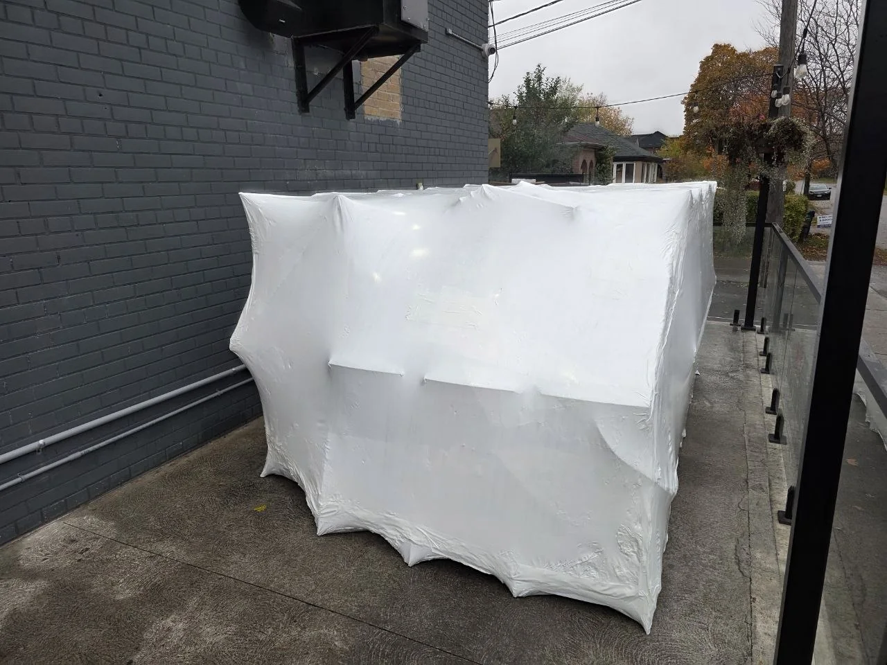 Commercial outdoor inventory sealed together in fitted shrink wrap